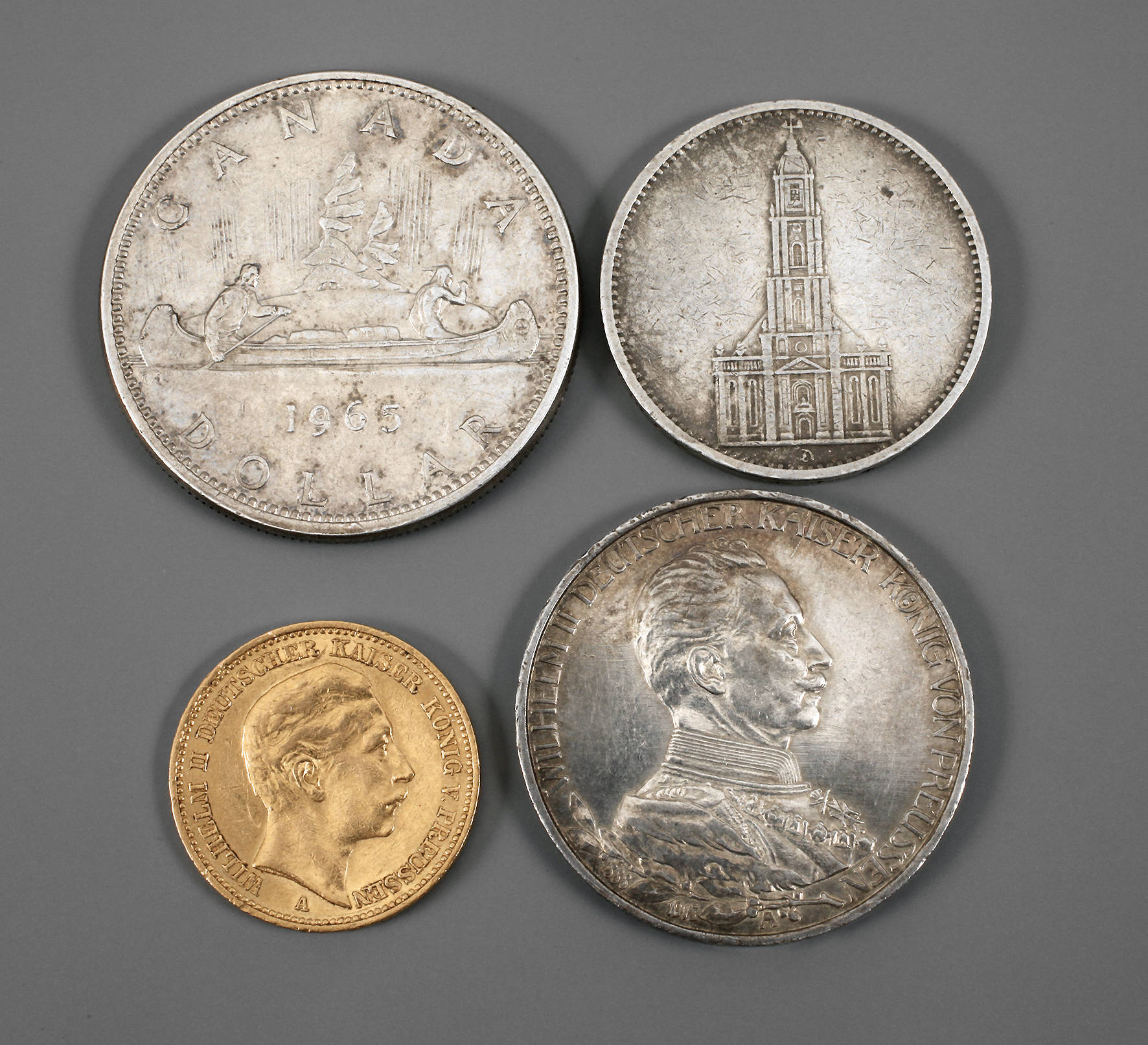 Vier Münzen