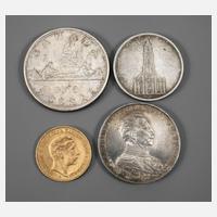 Vier Münzen111