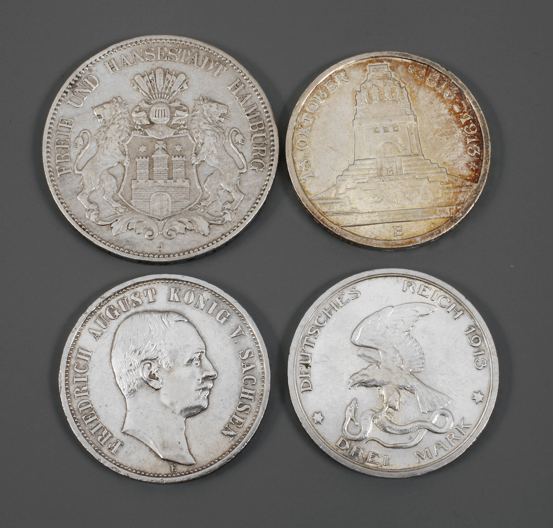 Vier Münzen D.R.