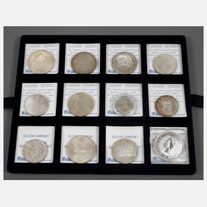 Zwölf Silbermünzen international