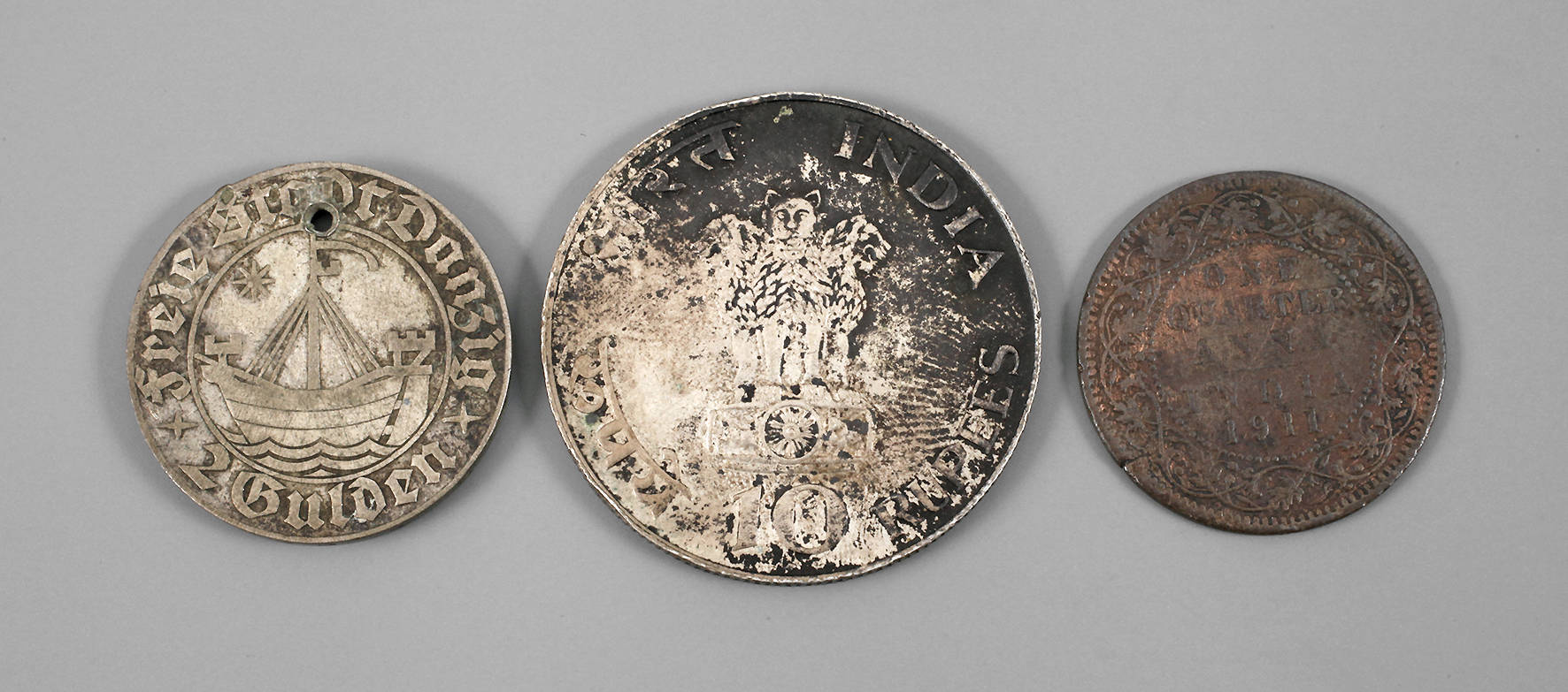 Drei Münzen Ausland