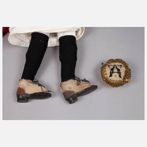 Frühe Brustblattkopfpuppe