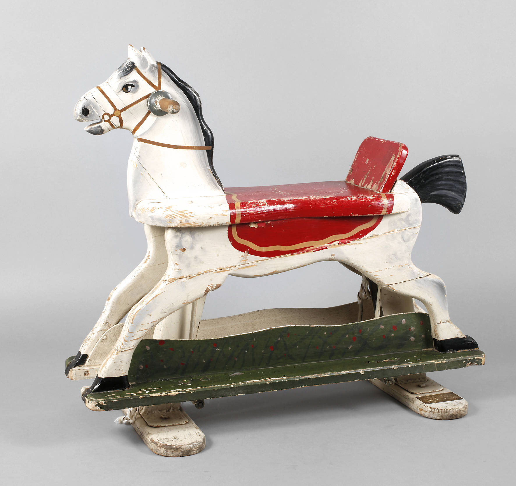 Schaukelpferd als Werbedisplay