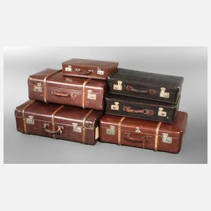 Sechs Reisekoffer