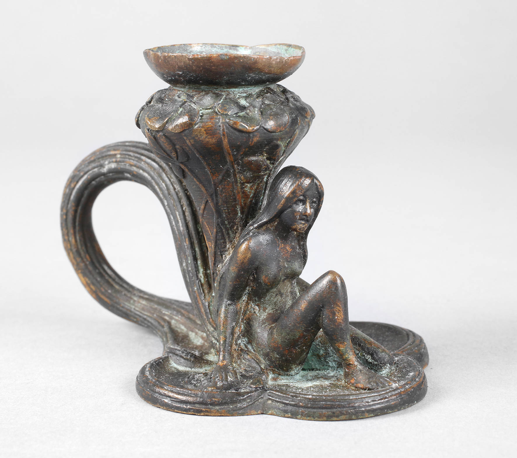 Figürlicher Handleuchter