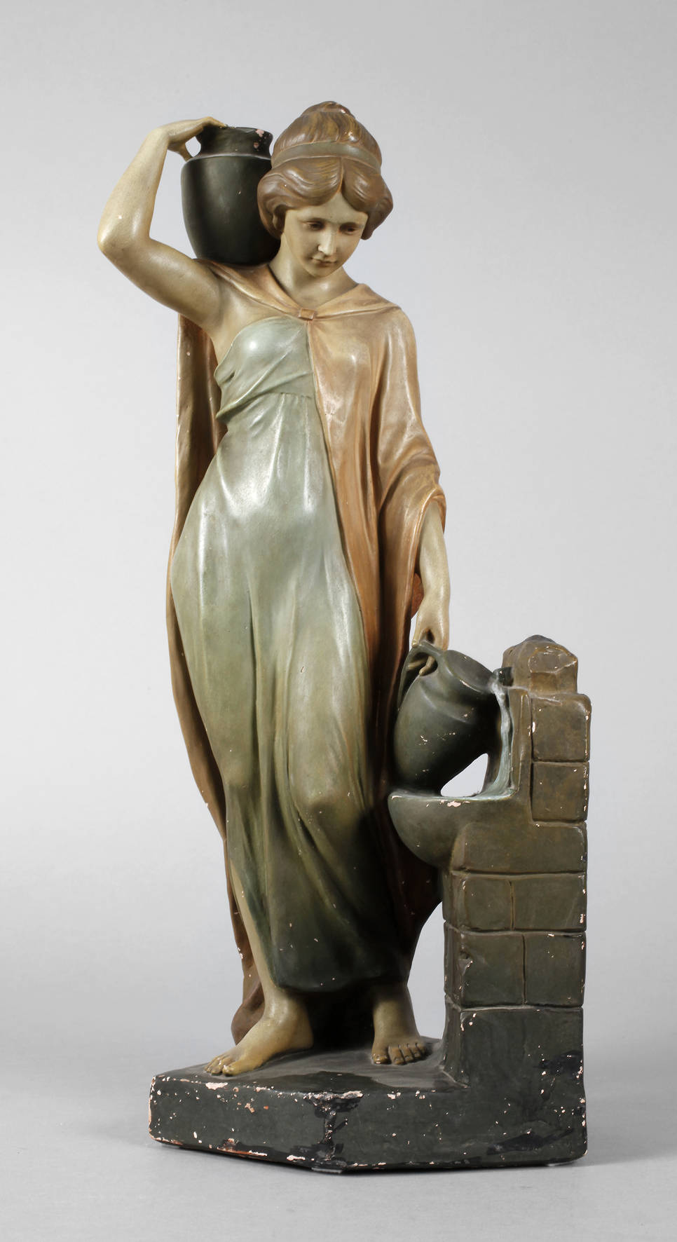 Wasserträgerin am Brunnen