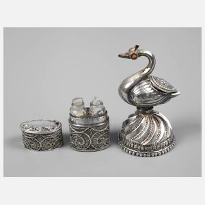 Zwei kleine Silberteile