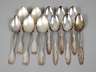 Elf große Silberlöffel