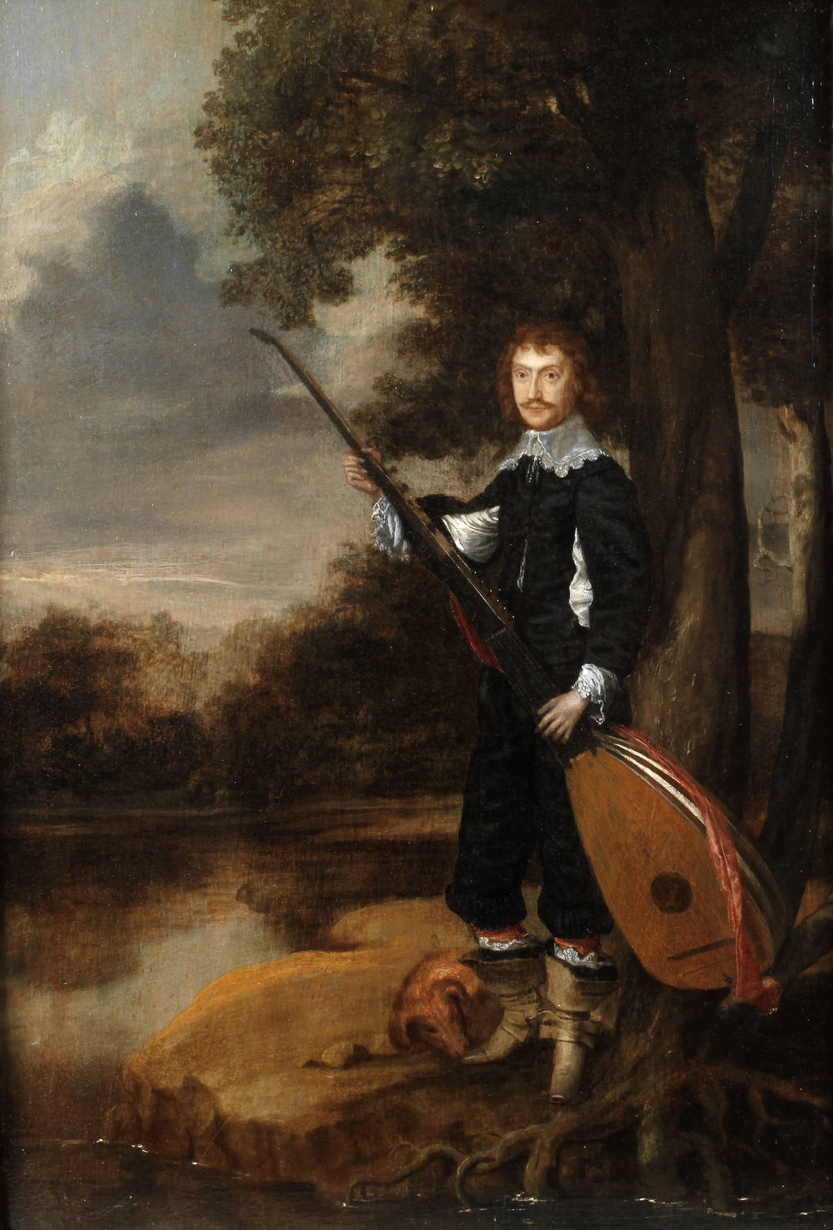 Junger Mann mit Theorbe am See