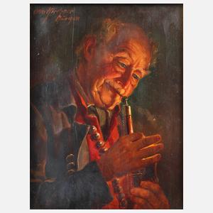 Otto Kirchner, alter Mann, seine Pfeife anzündend