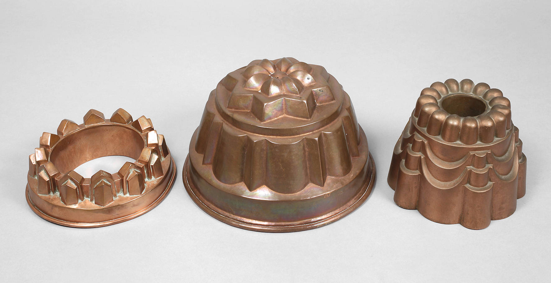 Drei Kupferbackformen