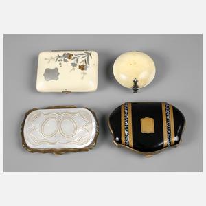 Vier kleine Geldbörsen