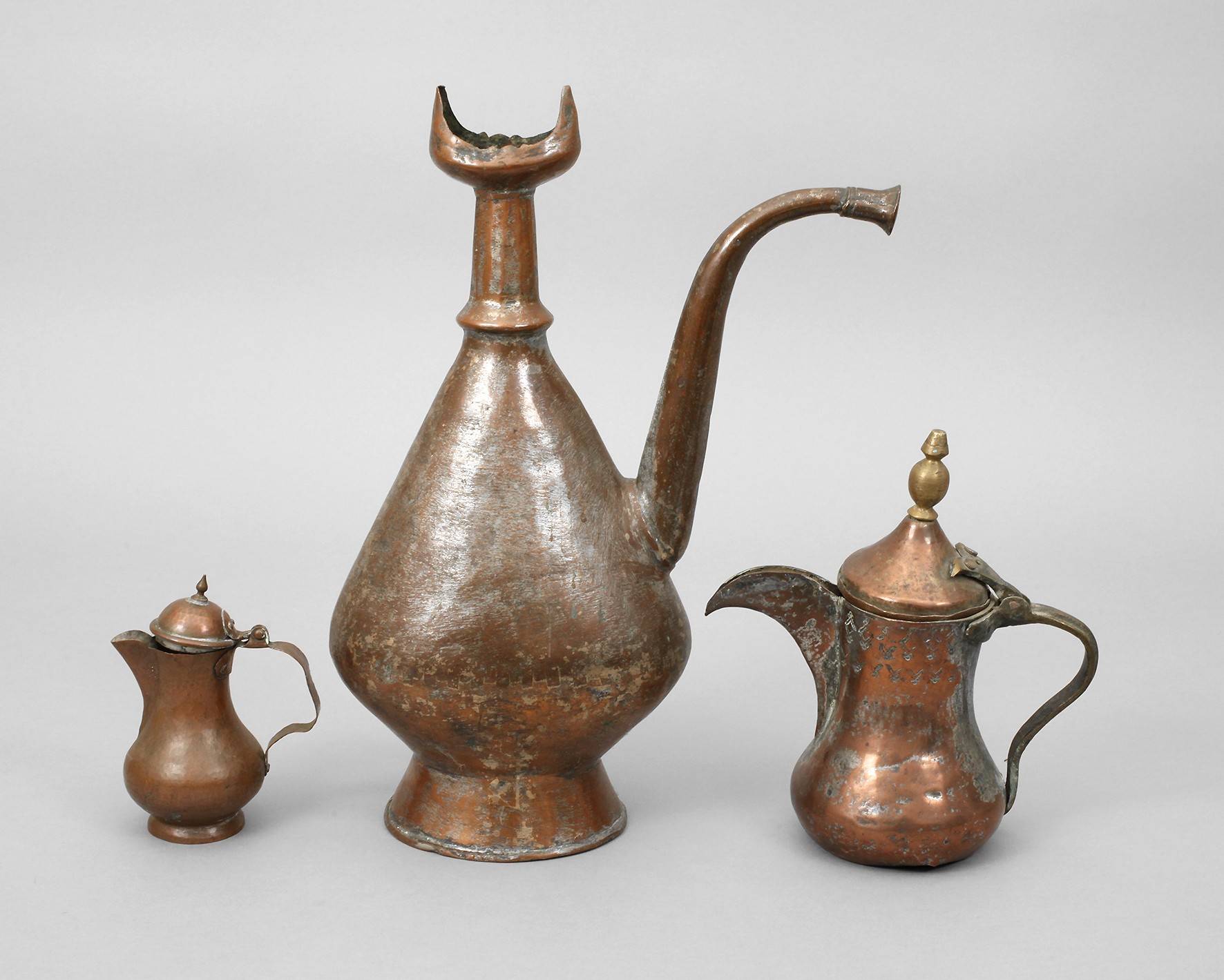 Drei Kupferkannen