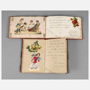 Zwei Poesiealben mit Oblaten