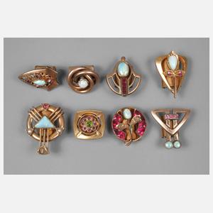 Acht Uhrenschieber mit Edelopalen