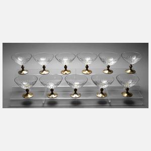 Elf Champagnerschalen mit Silberfuß