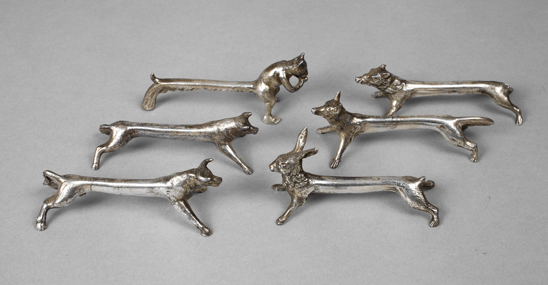 Sechs Messerbänkchen