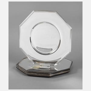 Zwölf versilberte Platzteller