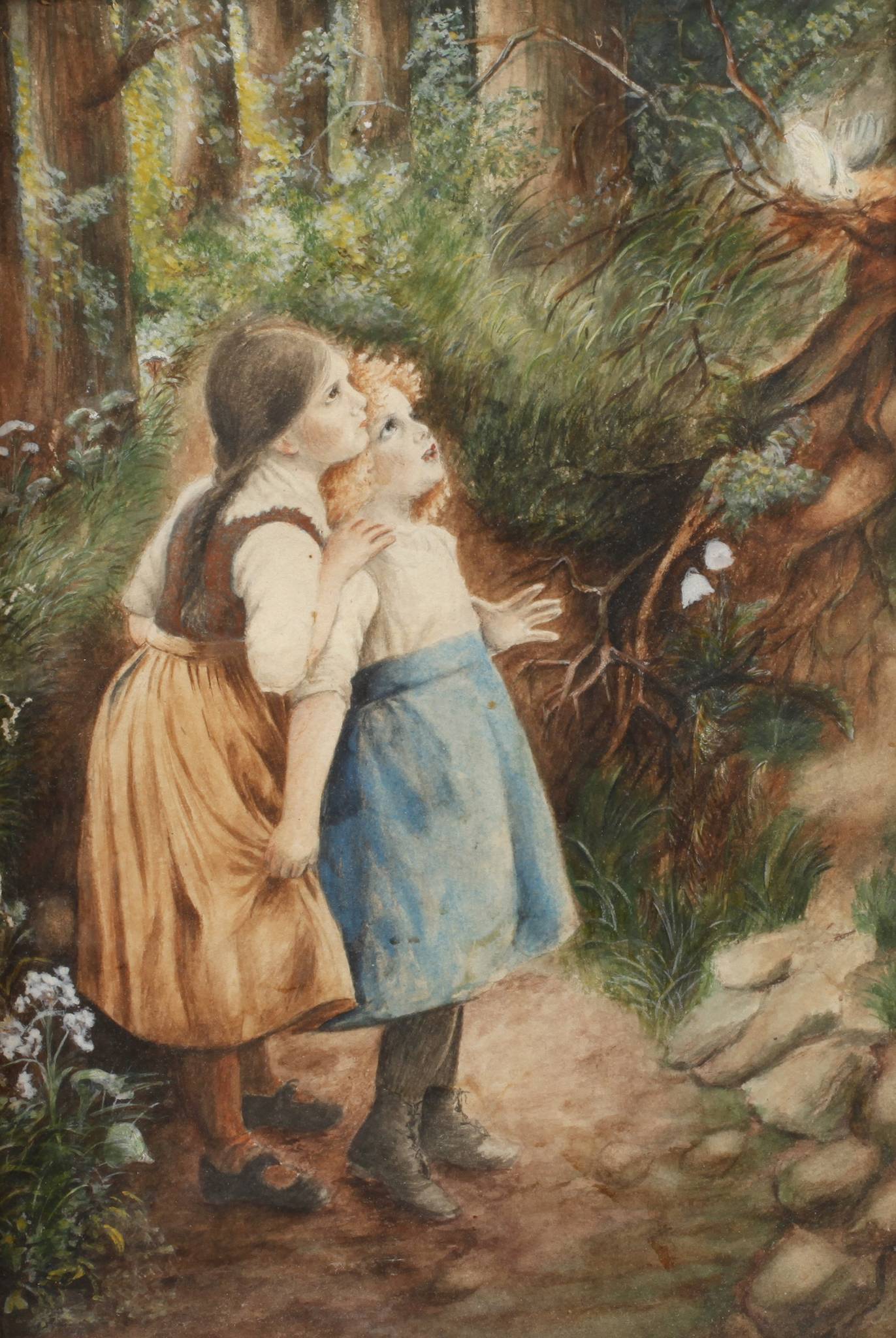 Zwei Mädchen einen Vogel beobachtend