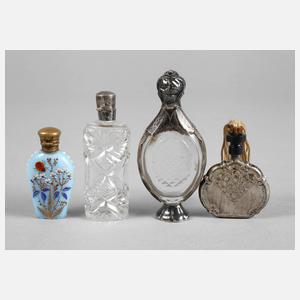 Vier Miniaturflakons,