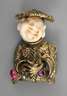 Chinese als Brosche/Anhänger