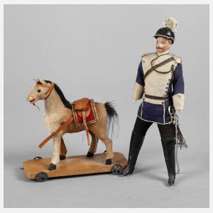 Puppenstubenpuppe als Offizier mit Pferd