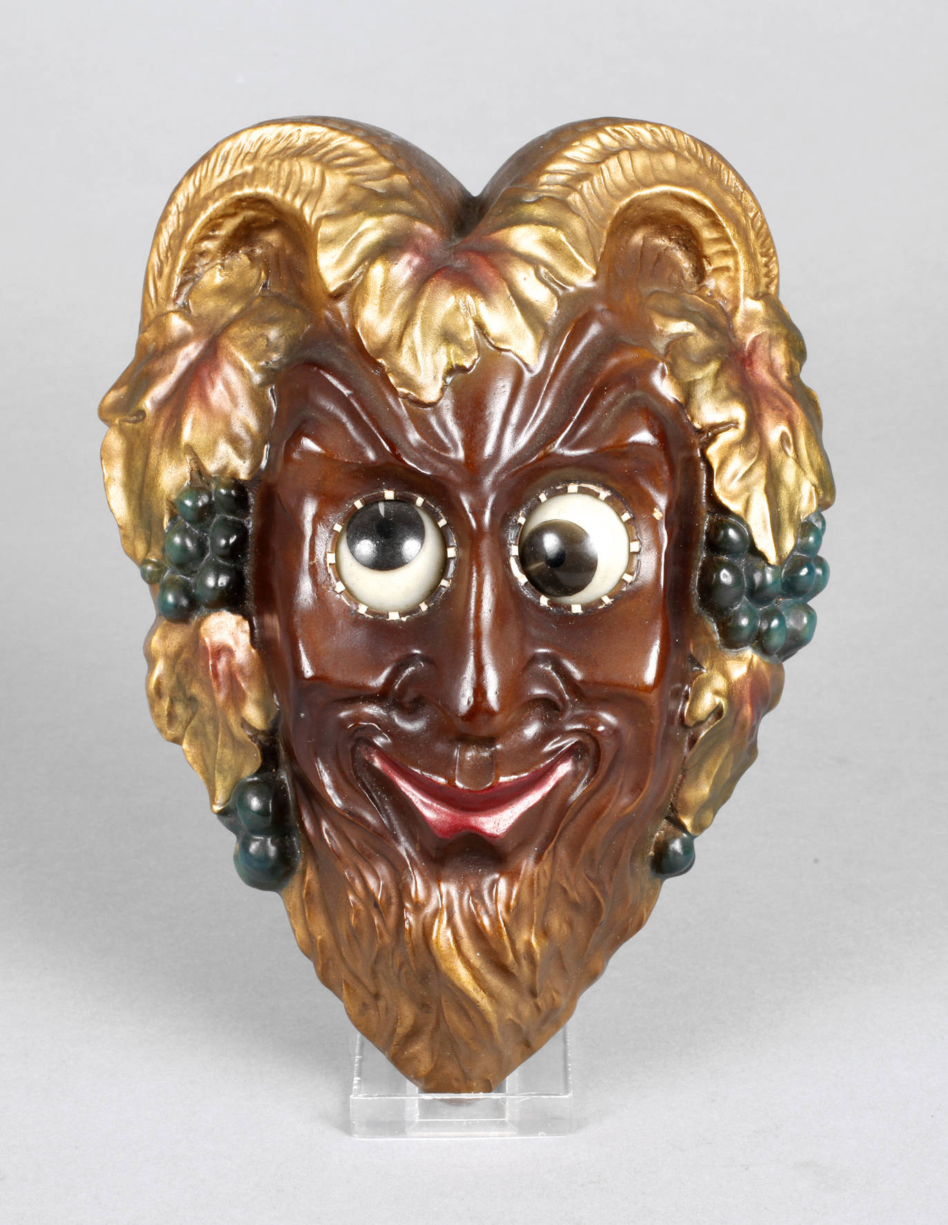 Wanduhr als Faunkopf