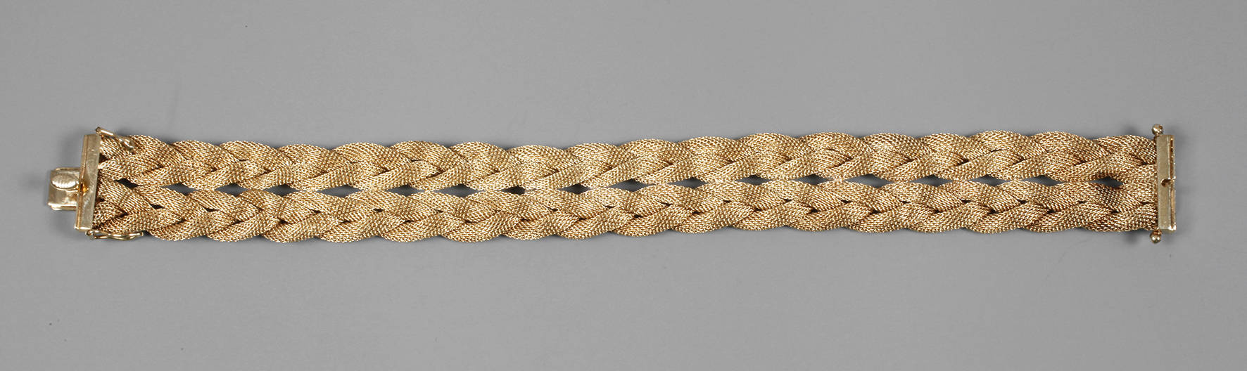 Goldenes Flechtarmband