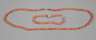 Korallencollier und Armband