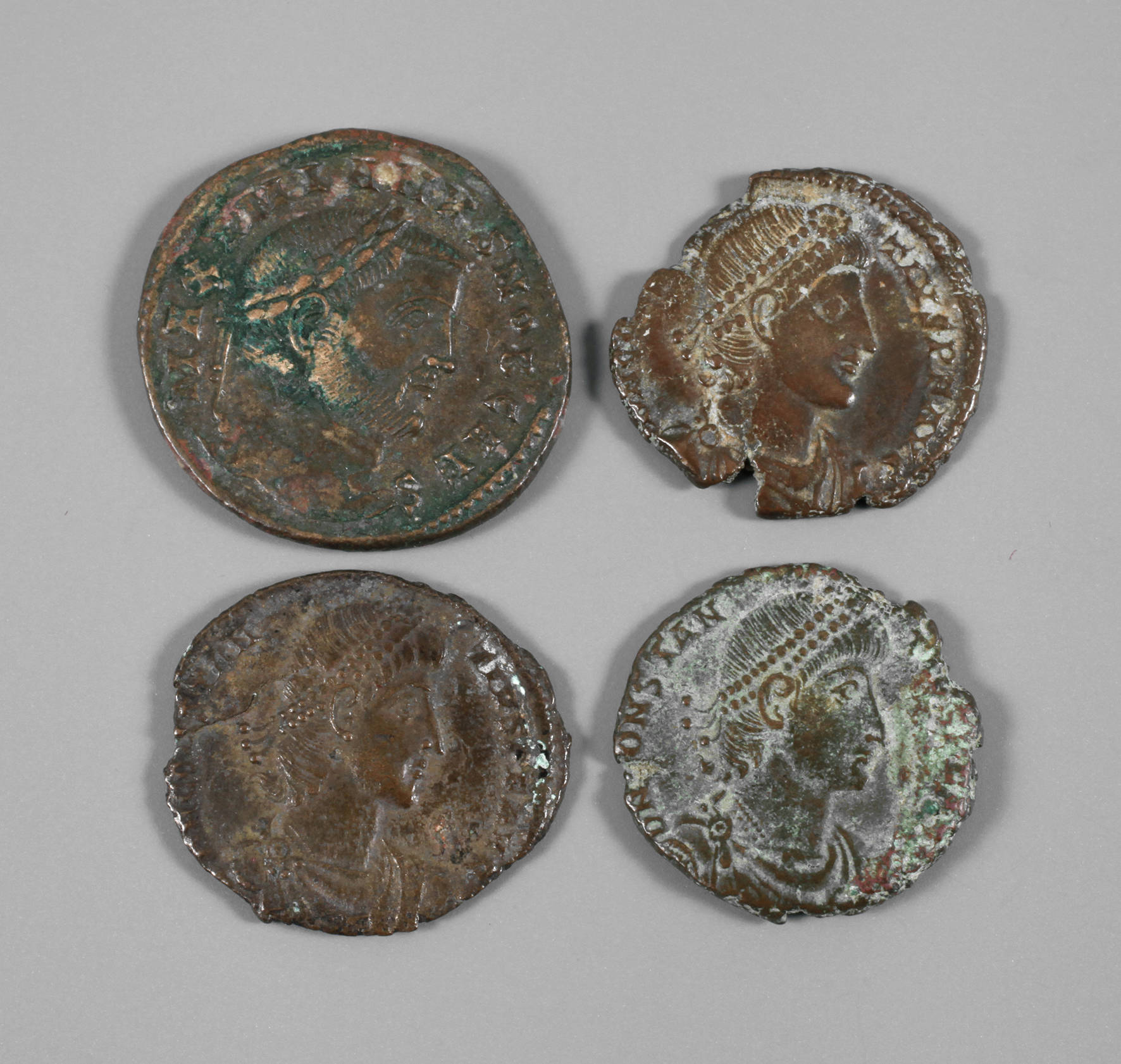 Vier Münzen Rom
