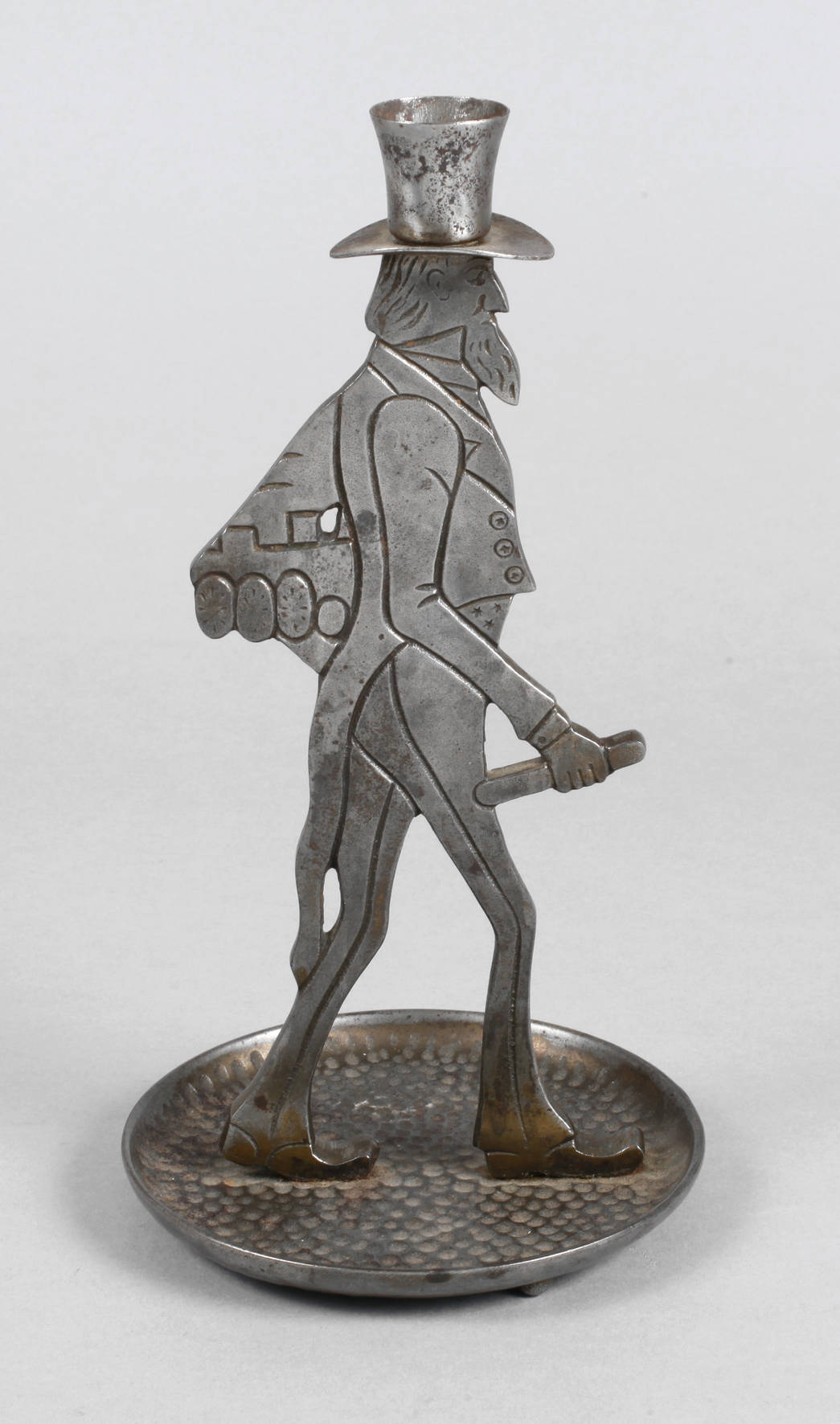 Figürlicher Eisenleuchter