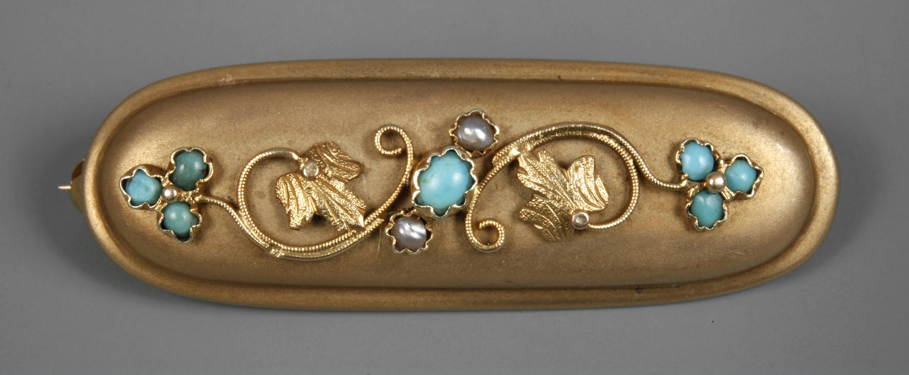 Jugendstilbrosche Gold mit Türkis