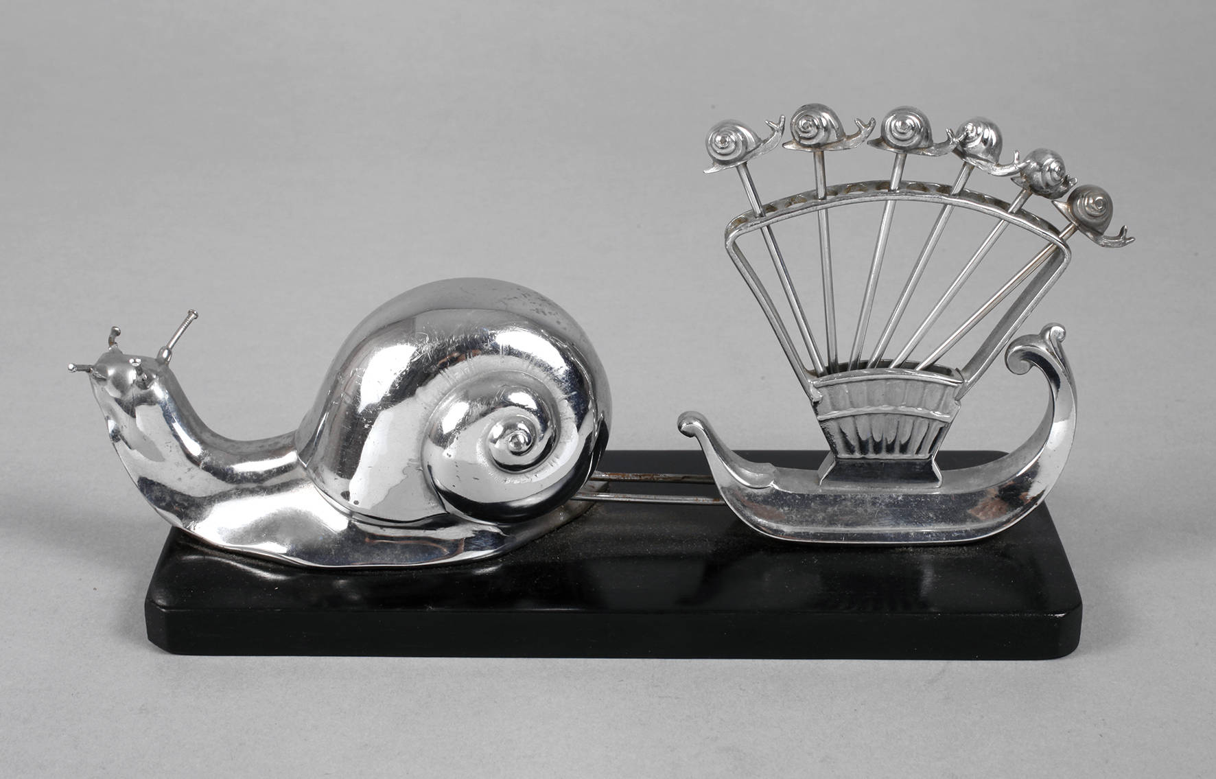 Schnecke als Spießchenständer