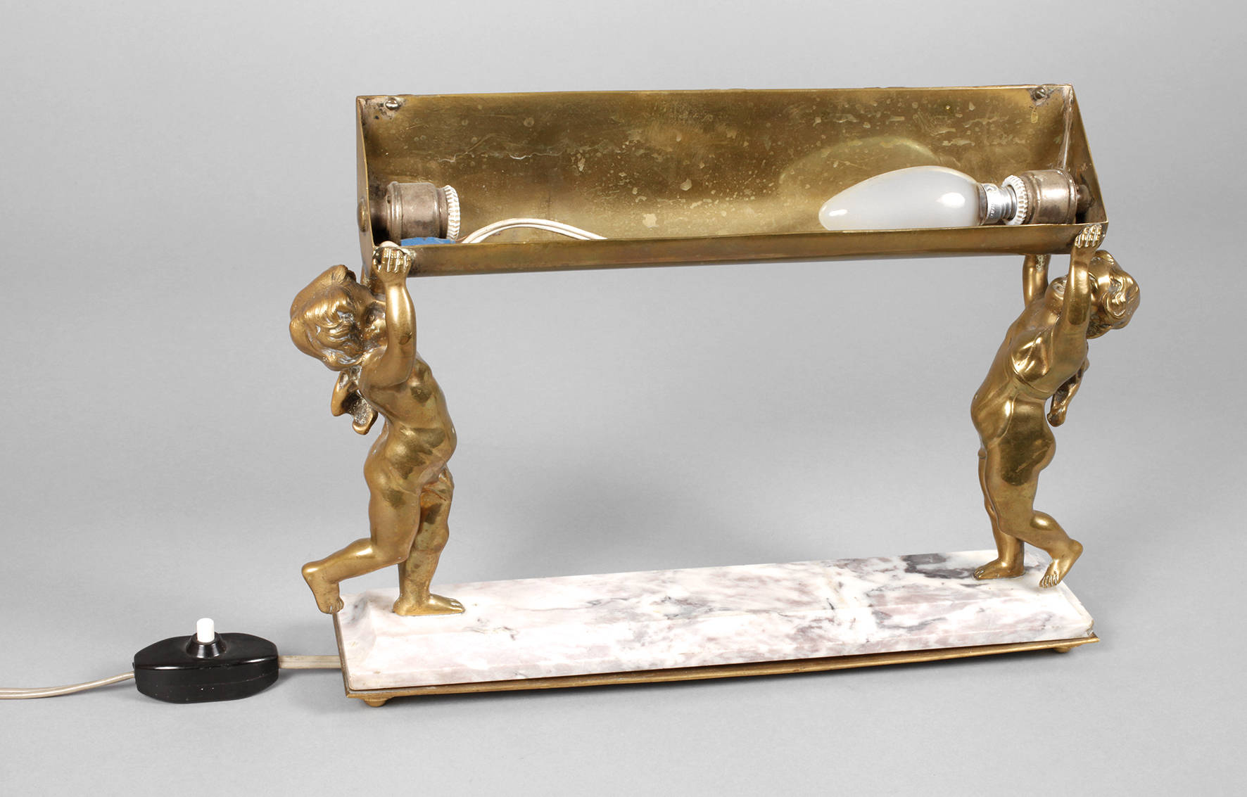 Figürliche Schreibtischlampe