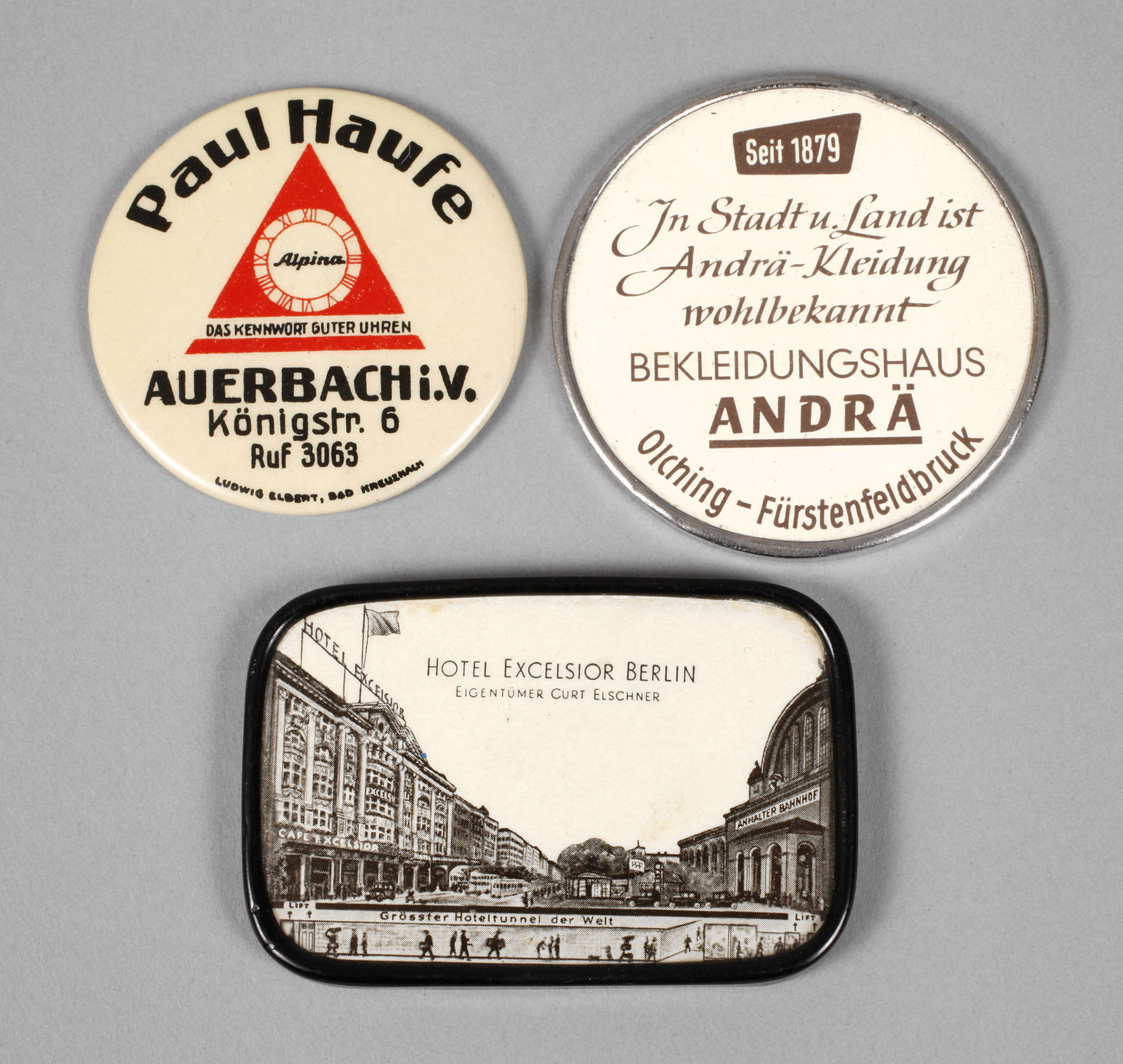 Drei Werbehandtaschenspiegel