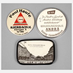 Drei Werbehandtaschenspiegel