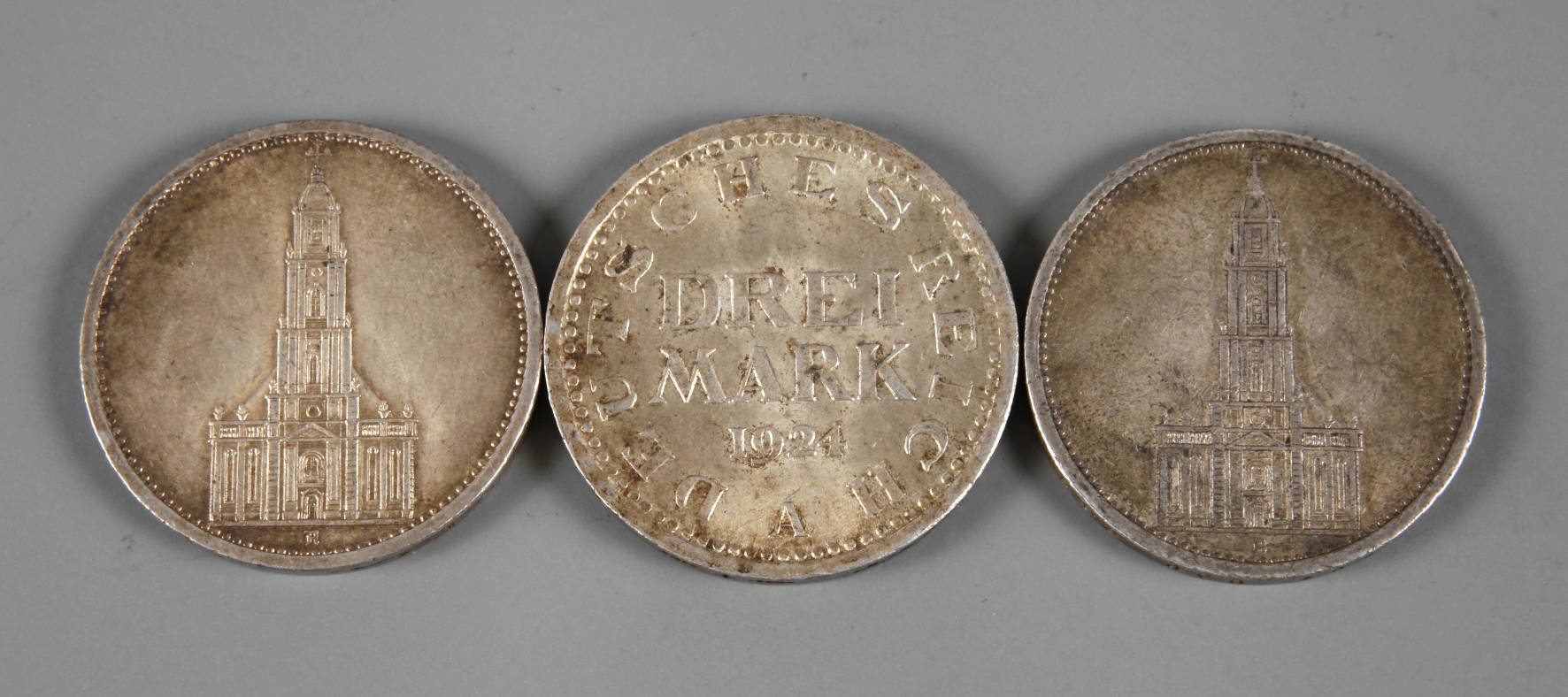 Drei Münzen