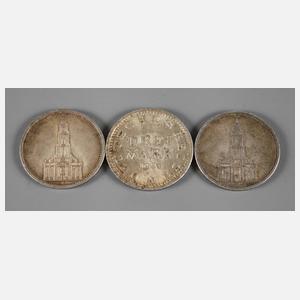 Drei Münzen