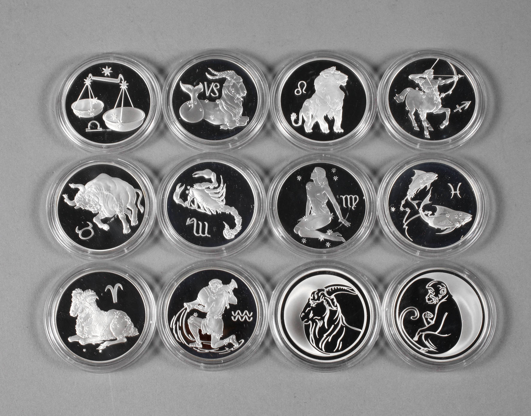 Zwölf Silbermünzen Russland