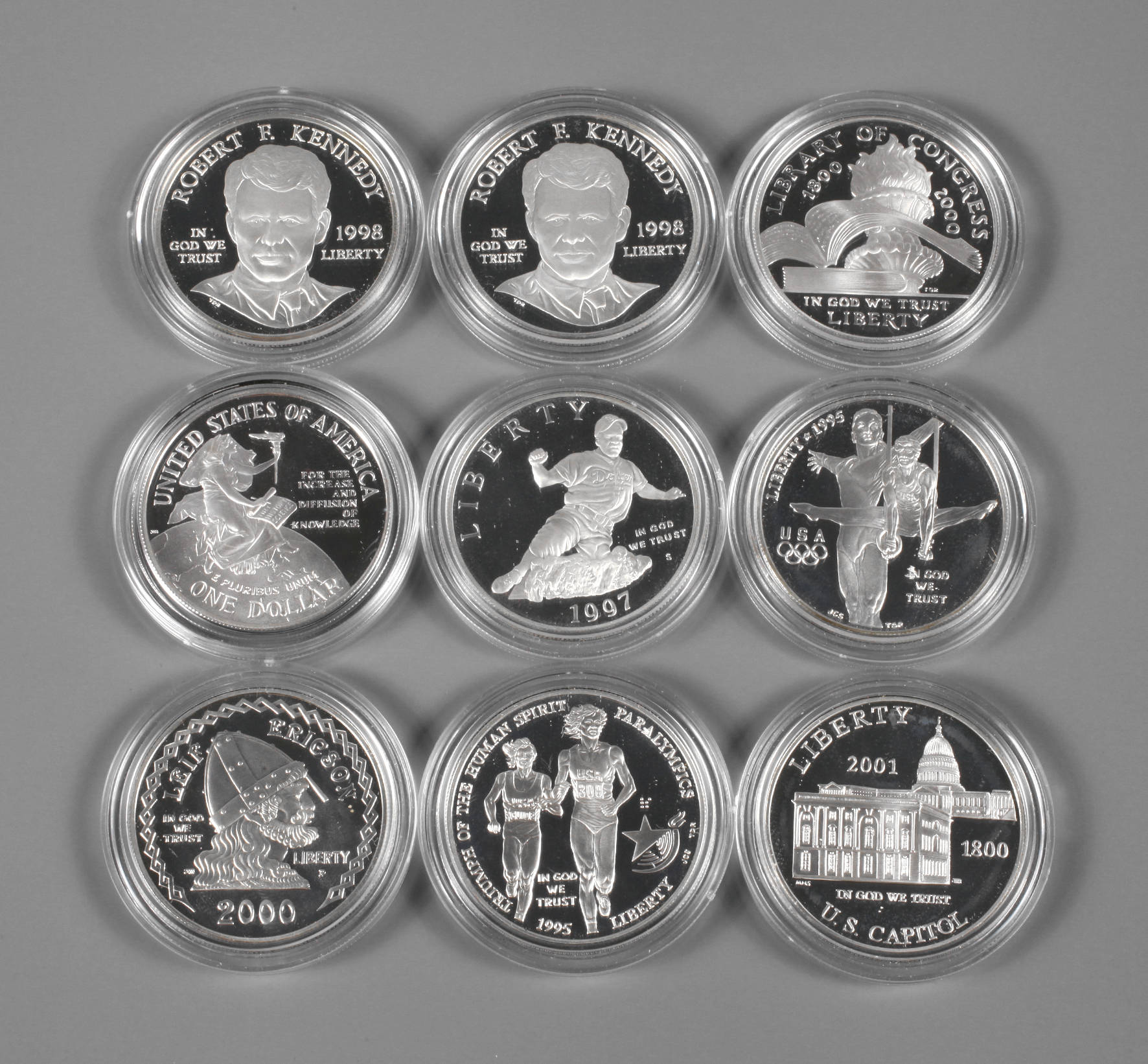 Neun Silberdollar USA