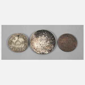 Drei Münzen Ausland