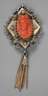 Goldbrosche mit Korallen