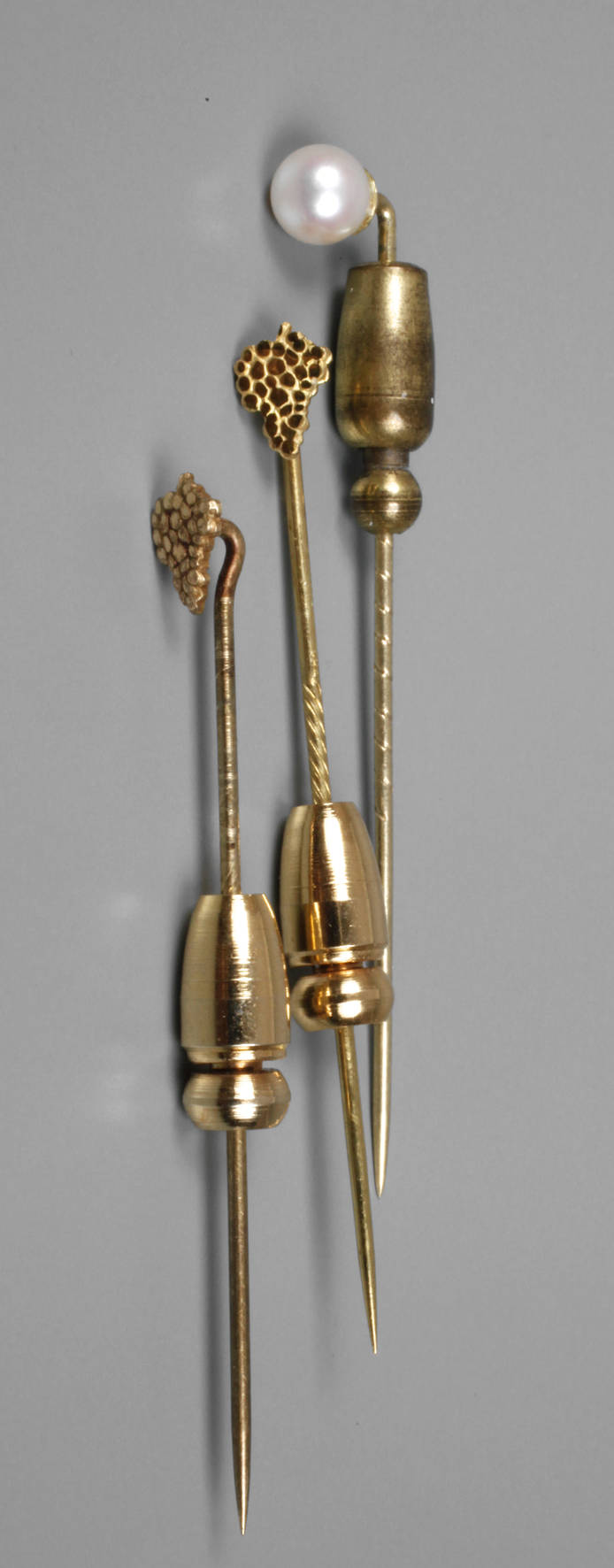 Drei Krawattennadeln