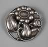 Silberbrosche mit Blütendekor