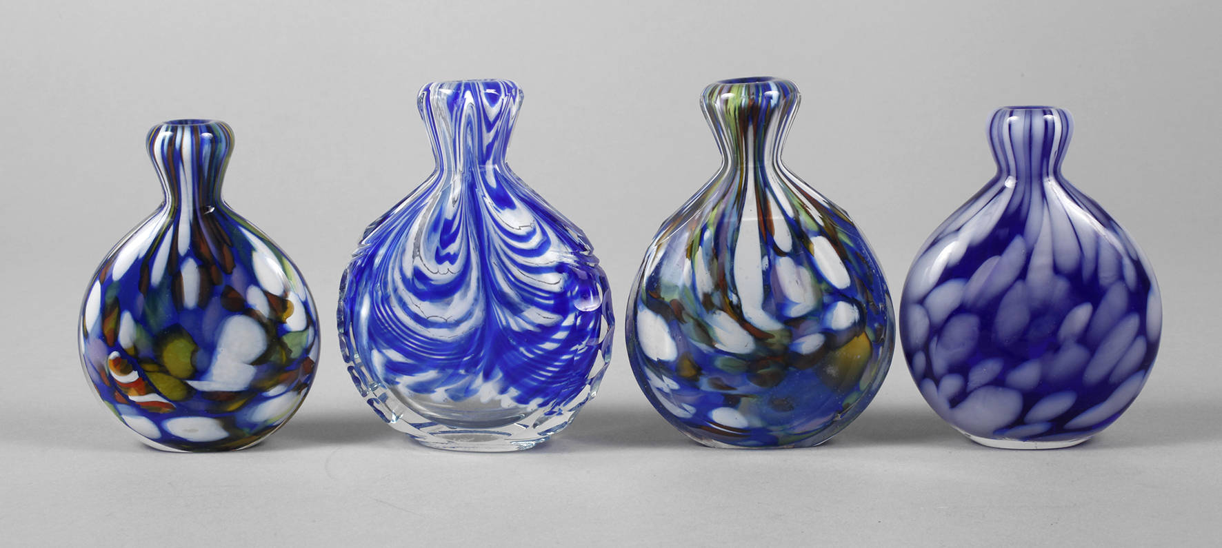 Vier Snuffbottles