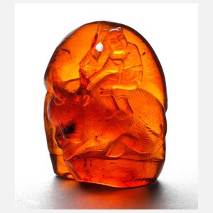 Bernsteinschnitzerei Bauer auf Büffel