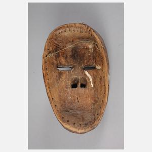 Kleine Gesichtermaske