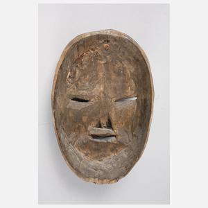 Kleine Gesichtermaske