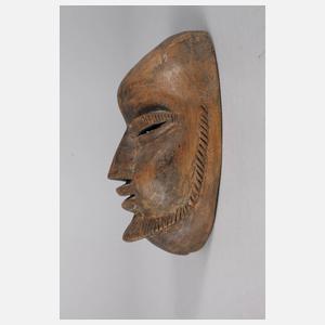 Kleine Gesichtermaske