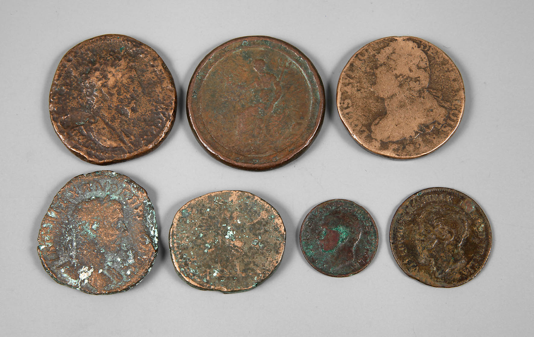 Sieben Münzen